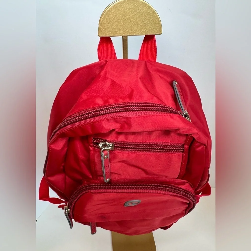 PAQ vibrant red backpack in like new condition